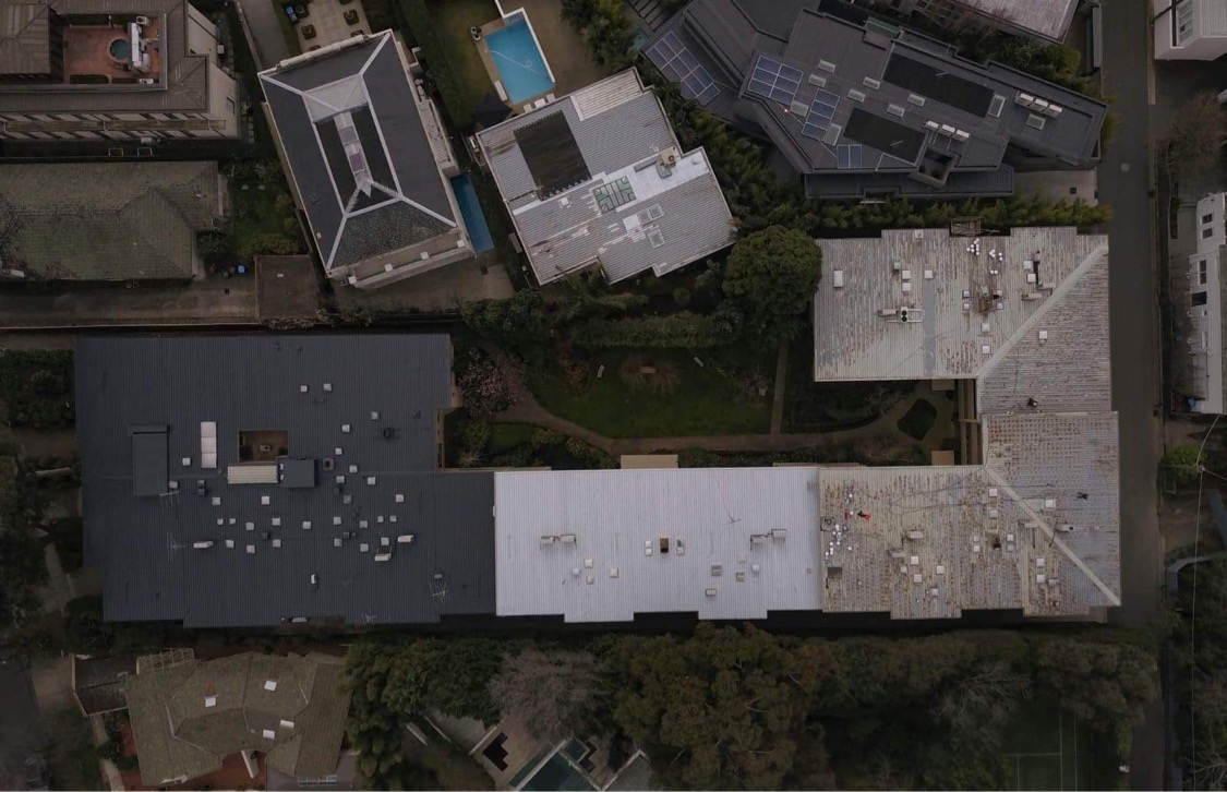 Aerial view of the Toorak roof showing weathered metal, light coating and dark finished sections
