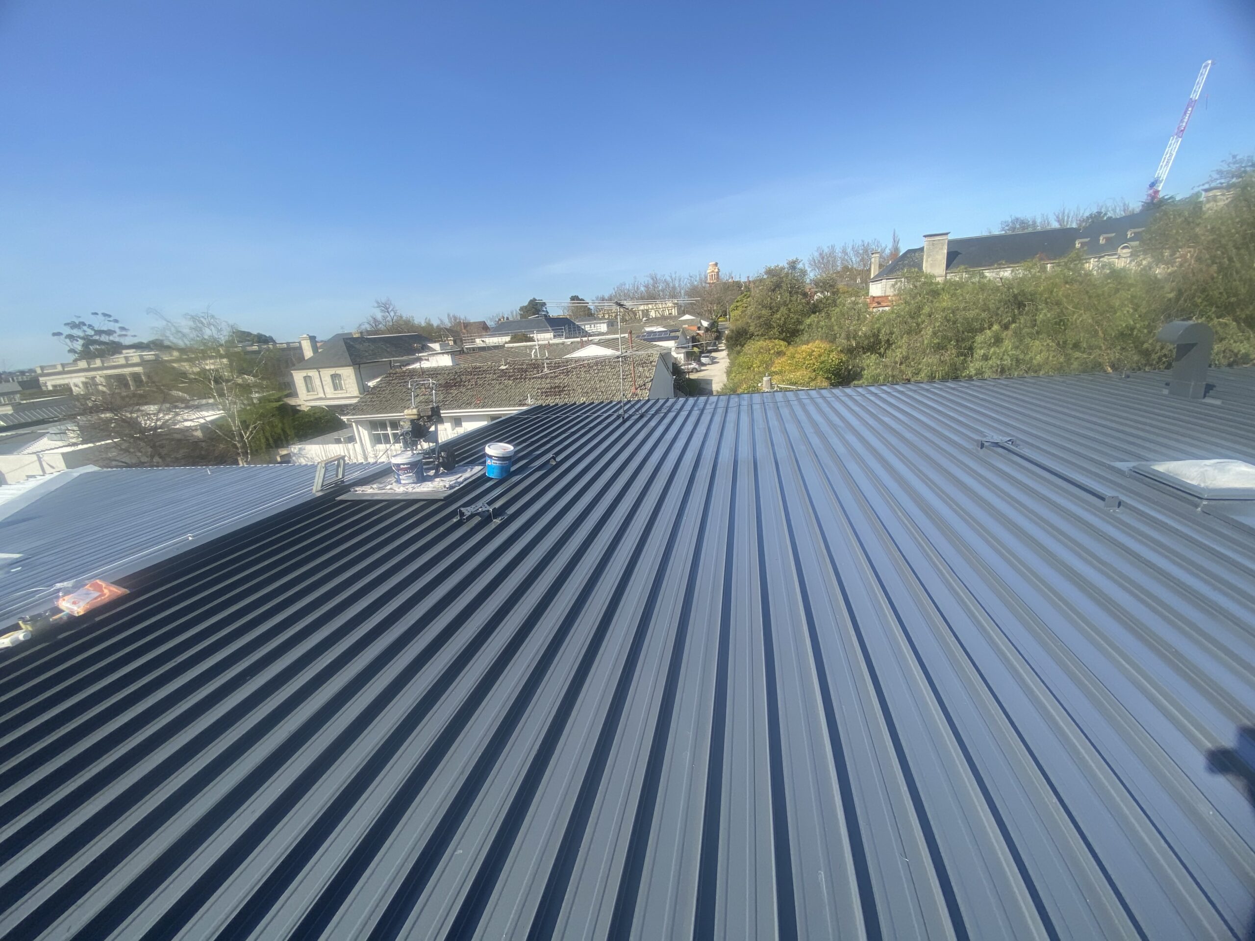 Wide view of the dark-grey coated metal roof
